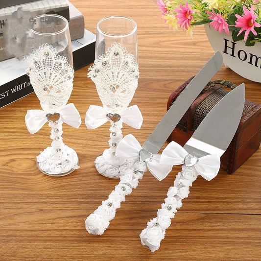 Four Piece Set Of Wine Glasses Knives And Forks